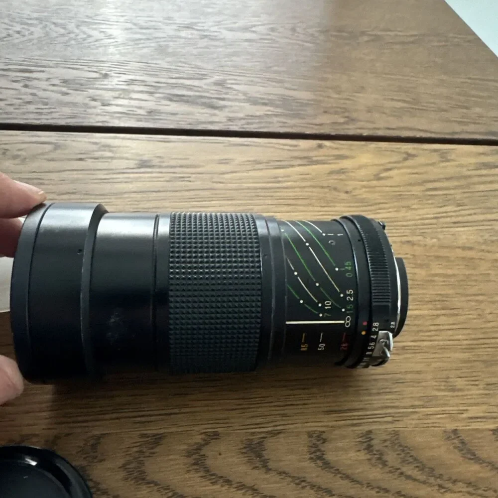vintage Vivitar 28-85mm f/2.8-3.8 MC macro focusing camera lens.